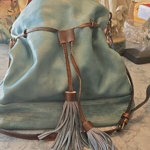 Elegant Blue Moda Luxe Crossbody Bucket Boho Bag With Fringed Drawstring.